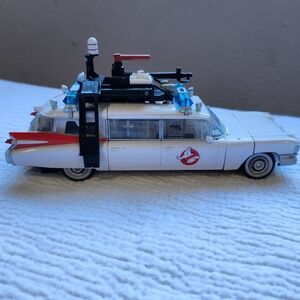 Used Good Condition, Missing Parts. Hasbro Ghostbusters Ecto-1 Action Figure.